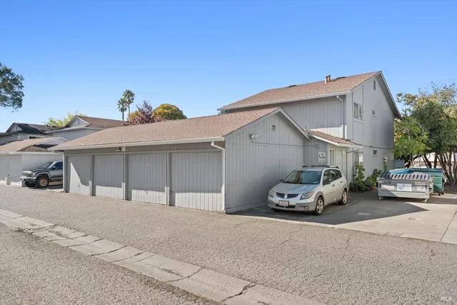 a car parked in front of a house