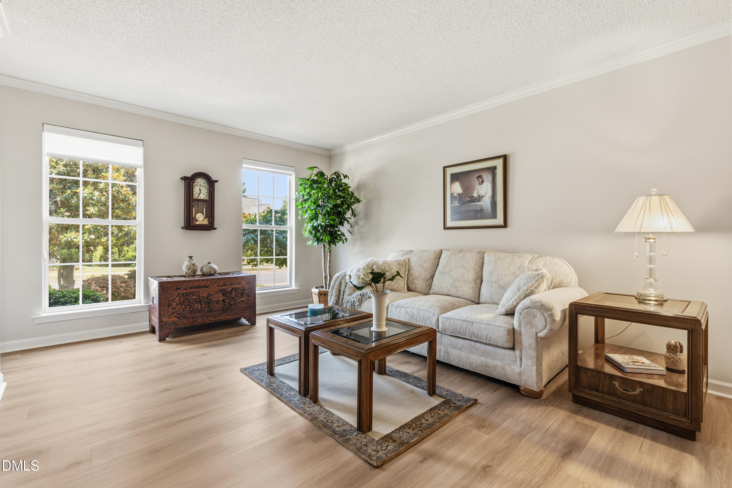 1211 Waterford Green Drive Apex, NC 27502 - Photo 14 of 53 a living room with furniture and a window