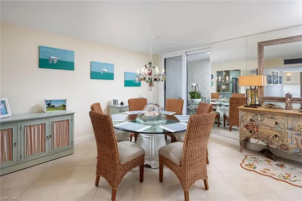 a view of a dining room with furniture