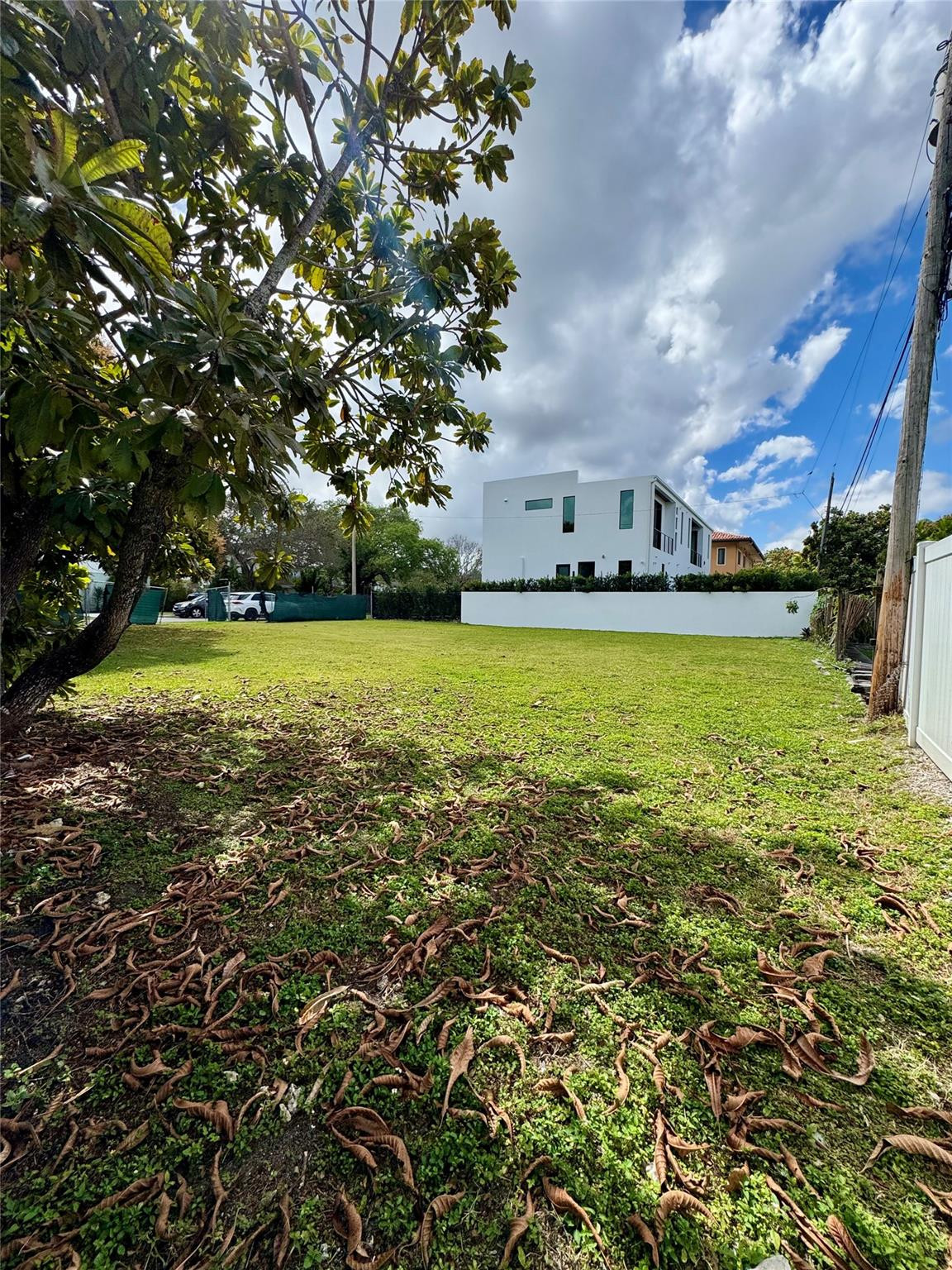 4221 Southwest 11th Street Miami, FL 33134 - Photo 5 of 10 a view of a swimming pool and a yard