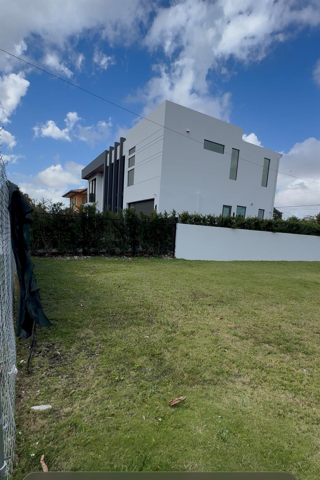 4221 Southwest 11th Street Miami, FL 33134 - Photo 9 of 10 a front view of house with yard and garage