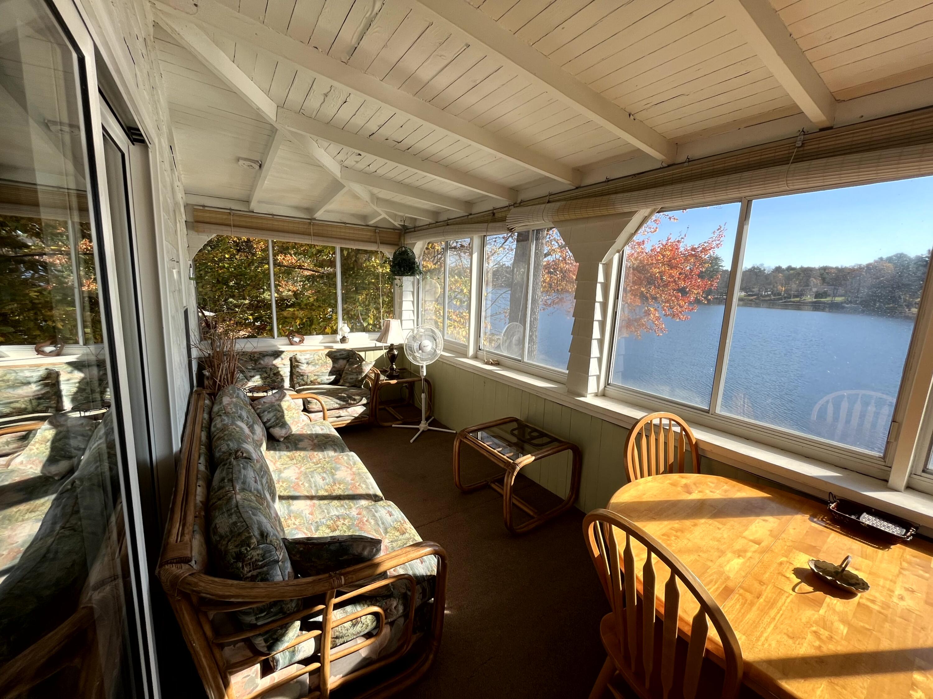 115 61 Fire Road South China, ME 04358 - Photo 28 of 33 28 Sun Porch_Over looking Water
