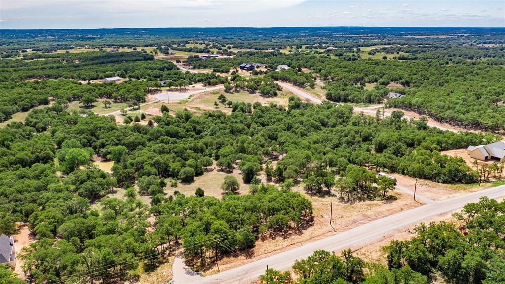 310 Rolling Bnd Road Alvord, TX 76225 - Photo 11 of 24 Aerial view of the 2-acre lot offering lots of trees and beautiful rolling terrain.