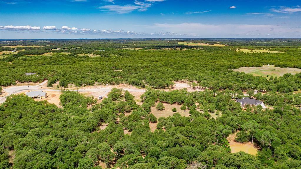 310 Rolling Bnd Road Alvord, TX 76225 - Photo 12 of 24 Aerial view of the 2-acre lot offering lots of trees and beautiful rolling terrain.