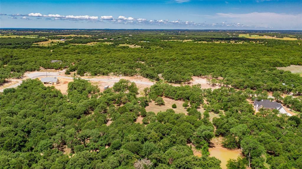 310 Rolling Bnd Road Alvord, TX 76225 - Photo 13 of 24 Aerial view of the 2-acre lot offering lots of trees and beautiful rolling terrain.