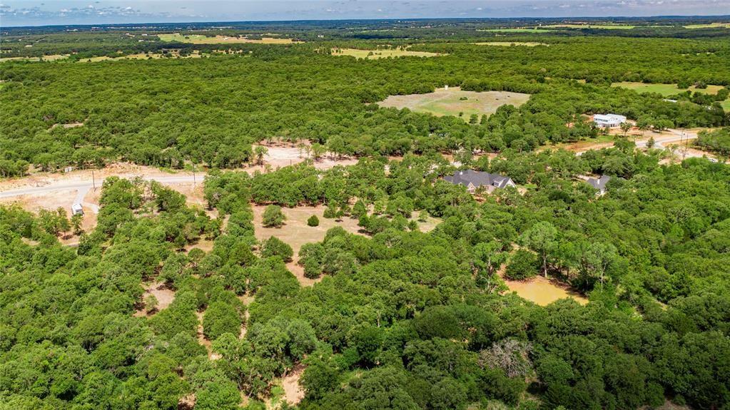 310 Rolling Bnd Road Alvord, TX 76225 - Photo 14 of 24 Aerial view of the 2-acre lot offering lots of trees and beautiful rolling terrain.