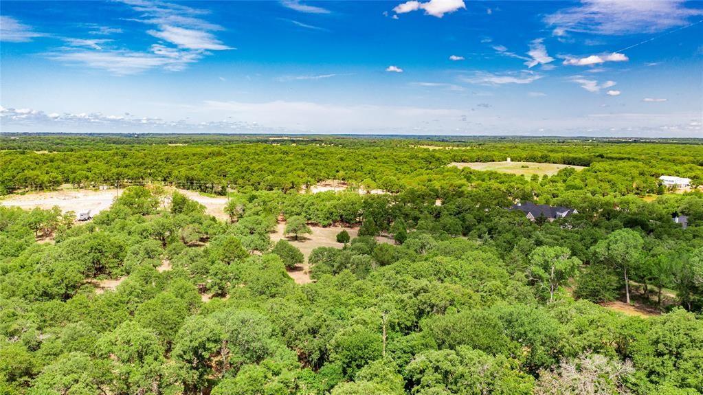 310 Rolling Bnd Road Alvord, TX 76225 - Photo 15 of 24 Aerial view of the 2-acre lot offering lots of trees and beautiful rolling terrain.