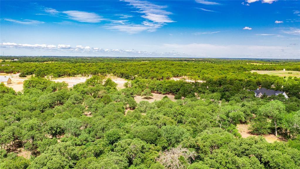 310 Rolling Bnd Road Alvord, TX 76225 - Photo 16 of 24 Aerial view of the 2-acre lot offering lots of trees and beautiful rolling terrain.