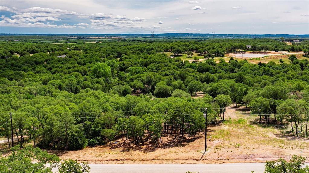 310 Rolling Bnd Road Alvord, TX 76225 - Photo 17 of 24 Aerial view of the 2-acre lot offering lots of trees and beautiful rolling terrain.