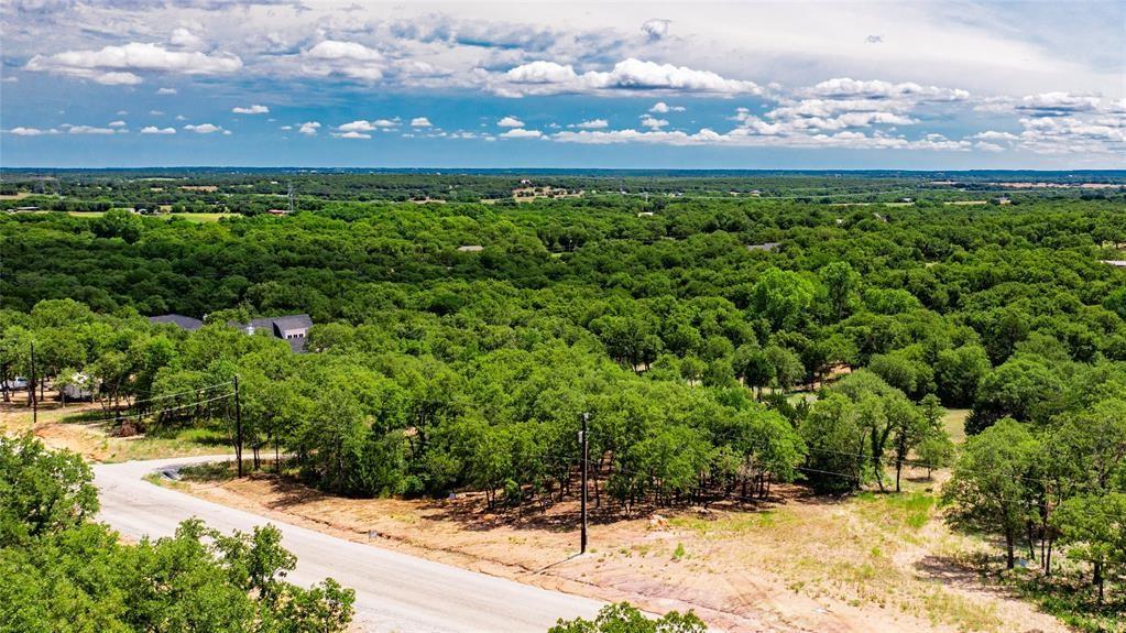 310 Rolling Bnd Road Alvord, TX 76225 - Photo 18 of 24 Aerial view of the 2-acre lot offering lots of trees and beautiful rolling terrain.