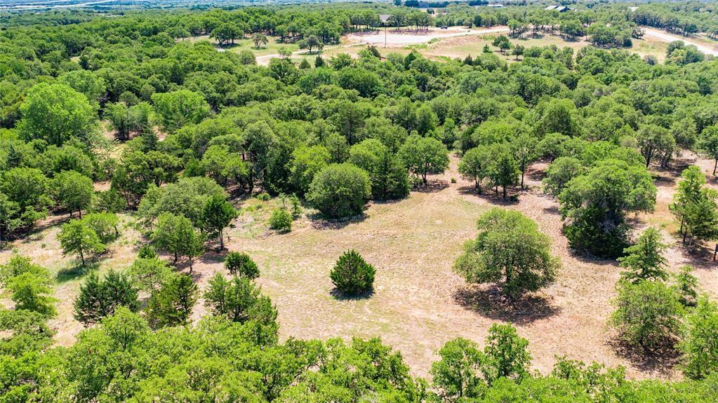 310 Rolling Bnd Road Alvord, TX 76225 - Photo 19 of 24 Aerial view of the 2-acre lot offering lots of trees and beautiful rolling terrain.
