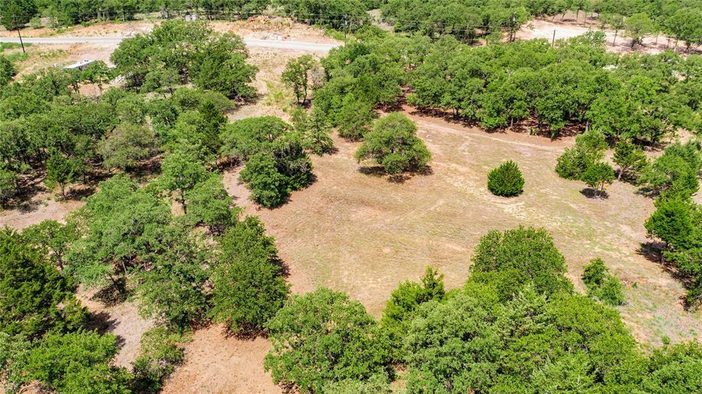 310 Rolling Bnd Road Alvord, TX 76225 - Photo 20 of 24 Aerial view of the 2-acre lot offering lots of trees and beautiful rolling terrain.