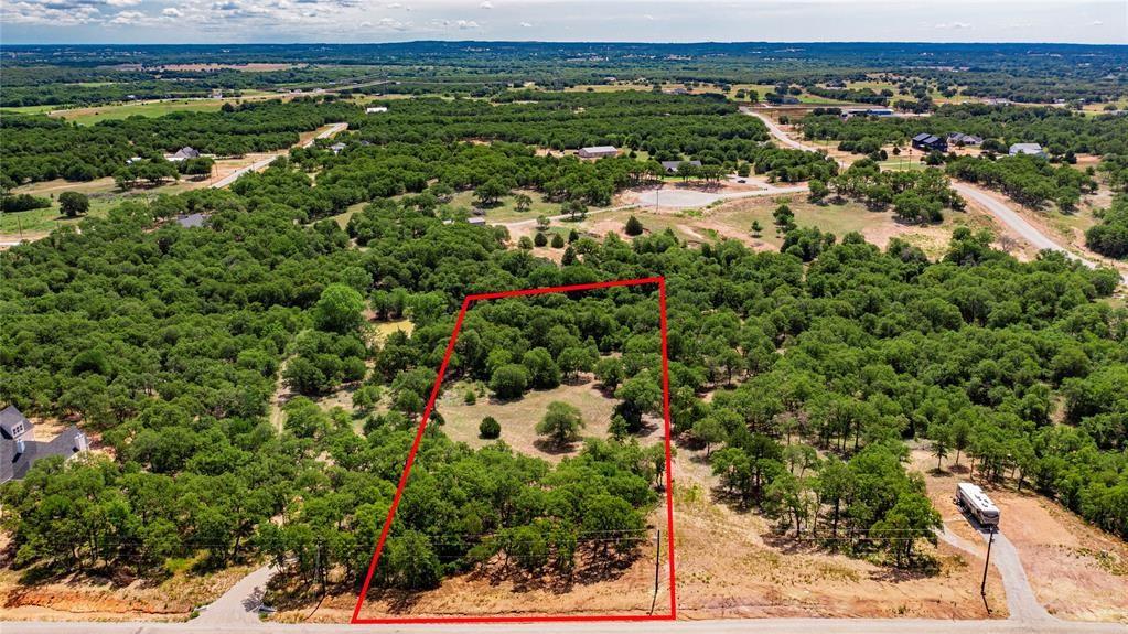 310 Rolling Bnd Road Alvord, TX 76225 - Photo 21 of 24 Aerial view of the 2-acre lot offering lots of trees and beautiful rolling terrain.