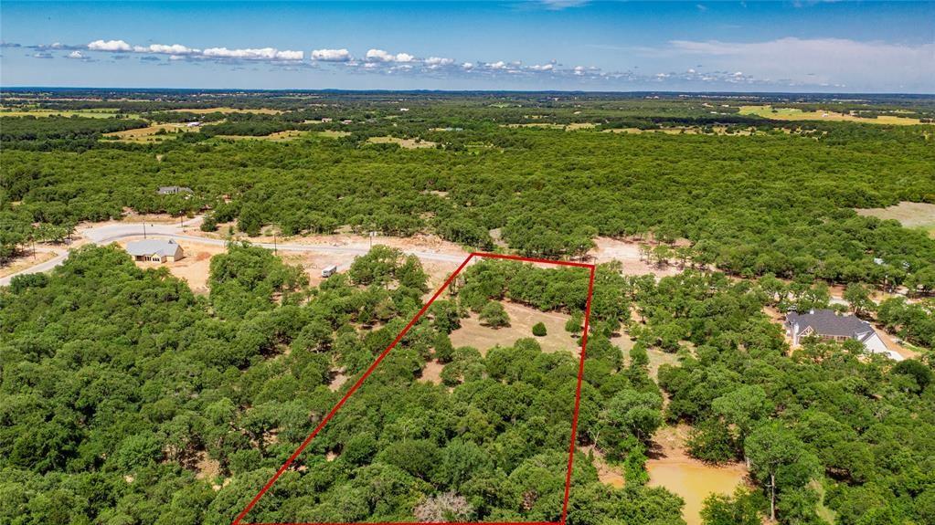 310 Rolling Bnd Road Alvord, TX 76225 - Photo 22 of 24 Aerial view of the 2-acre lot offering lots of trees and beautiful rolling terrain.