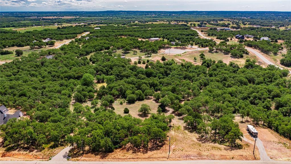 310 Rolling Bnd Road Alvord, TX 76225 - Photo 9 of 24 Aerial view of the 2-acre lot offering lots of trees and beautiful rolling terrain.