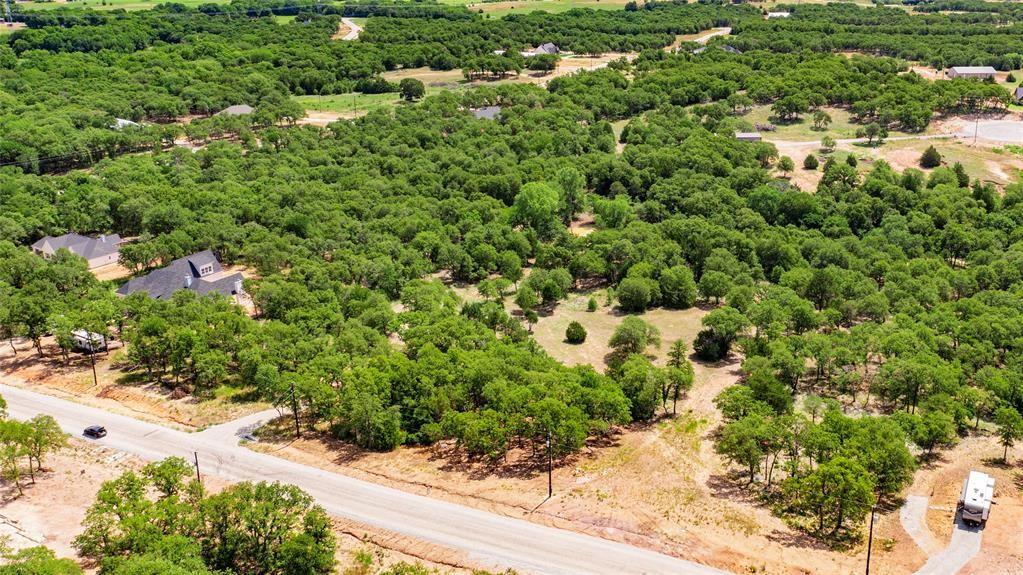 310 Rolling Bnd Road Alvord, TX 76225 - Photo 10 of 24 Aerial view of the 2-acre lot offering lots of trees and beautiful rolling terrain.