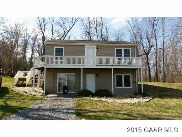 422 Steeles Fort Road Raphine, VA 24472 - Photo 1 of 10 a front view of a house with a garden