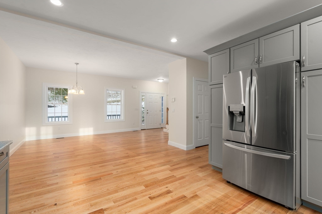 5 Miles Road Rutland, MA 01543 - Photo 14 of 35 a view of a kitchen with a refrigerator and window