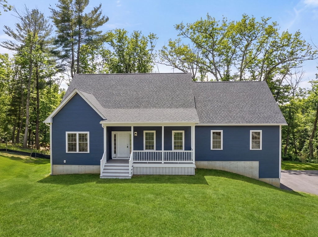 5 Miles Road Rutland, MA 01543 - Photo 2 of 37 a house view with a garden space