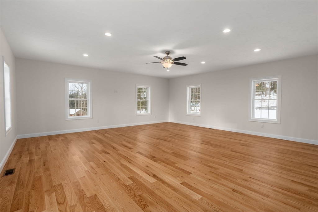 5 Miles Road Rutland, MA 01543 - Photo 21 of 35 a view of empty room with wooden floor and fan