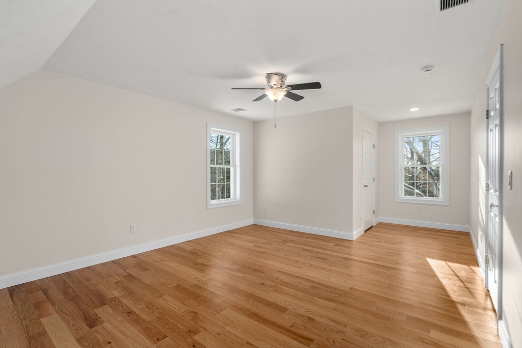5 Miles Road Rutland, MA 01543 - Photo 29 of 35 wooden floor in an empty room with a window