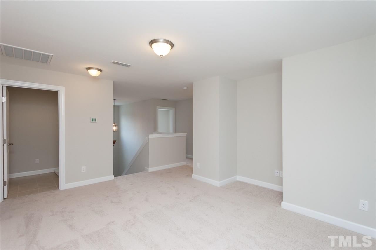 113 Spring Pine Lane Holly Springs, NC 27540 - Photo 18 of 25 a view of empty room