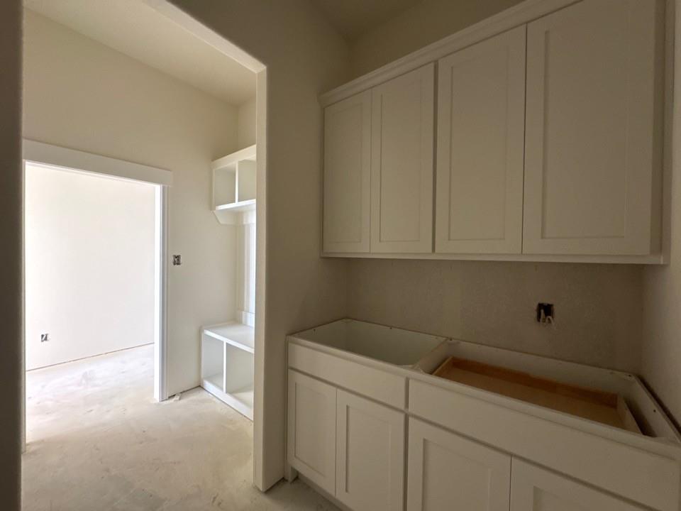 114 Brandywine Trail Rhome, TX 76078 - Photo 6 of 17 a room with storage and utility
