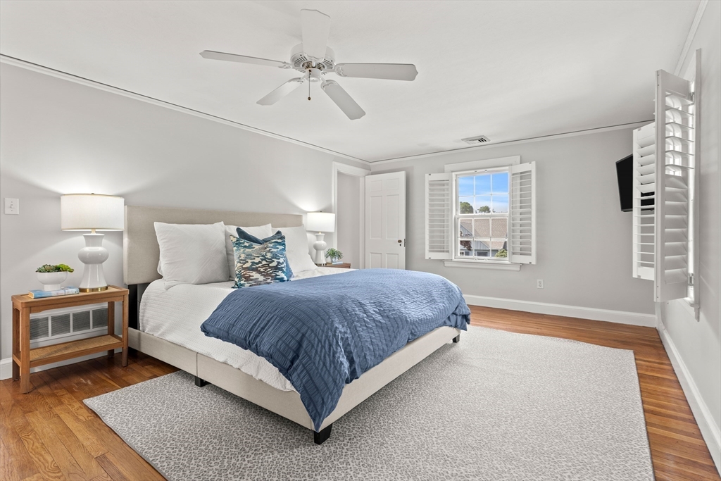 6 Shetland Road Marblehead, MA 01945 - Photo 19 of 39 a spacious bedroom with a bed and window