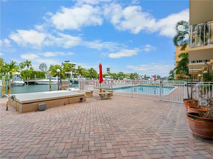 a view of a swimming pool with outdoor space