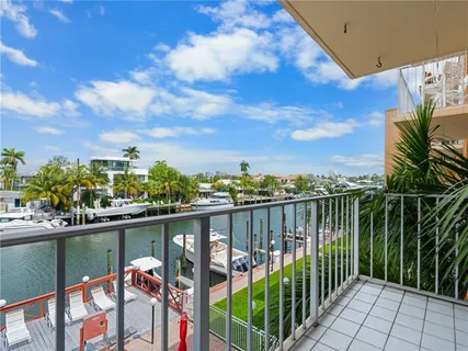 a view of a lake from a balcony