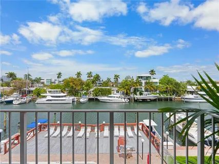 a view of swimming pool from a balcony