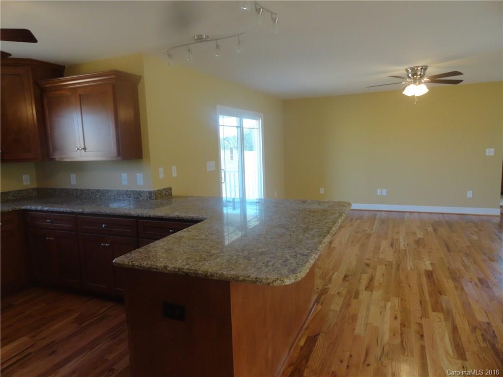 4767 Kemp Dellinger Road, Unit 2 Maiden, NC 28650 - Photo 9 of 21 a kitchen with a sink and cabinets