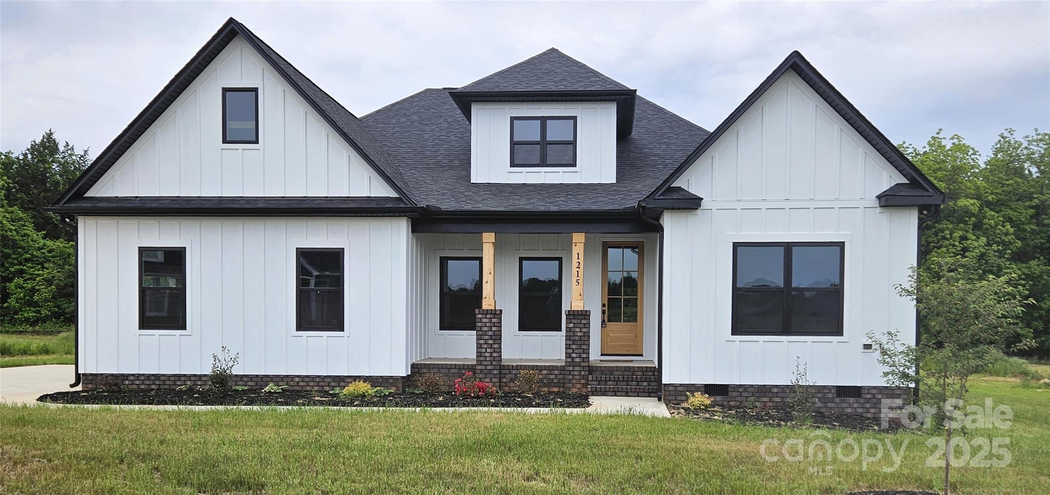 1215 Coppergate Drive Salisbury, NC 28147 - Photo 1 of 41 a front view of a house with a yard