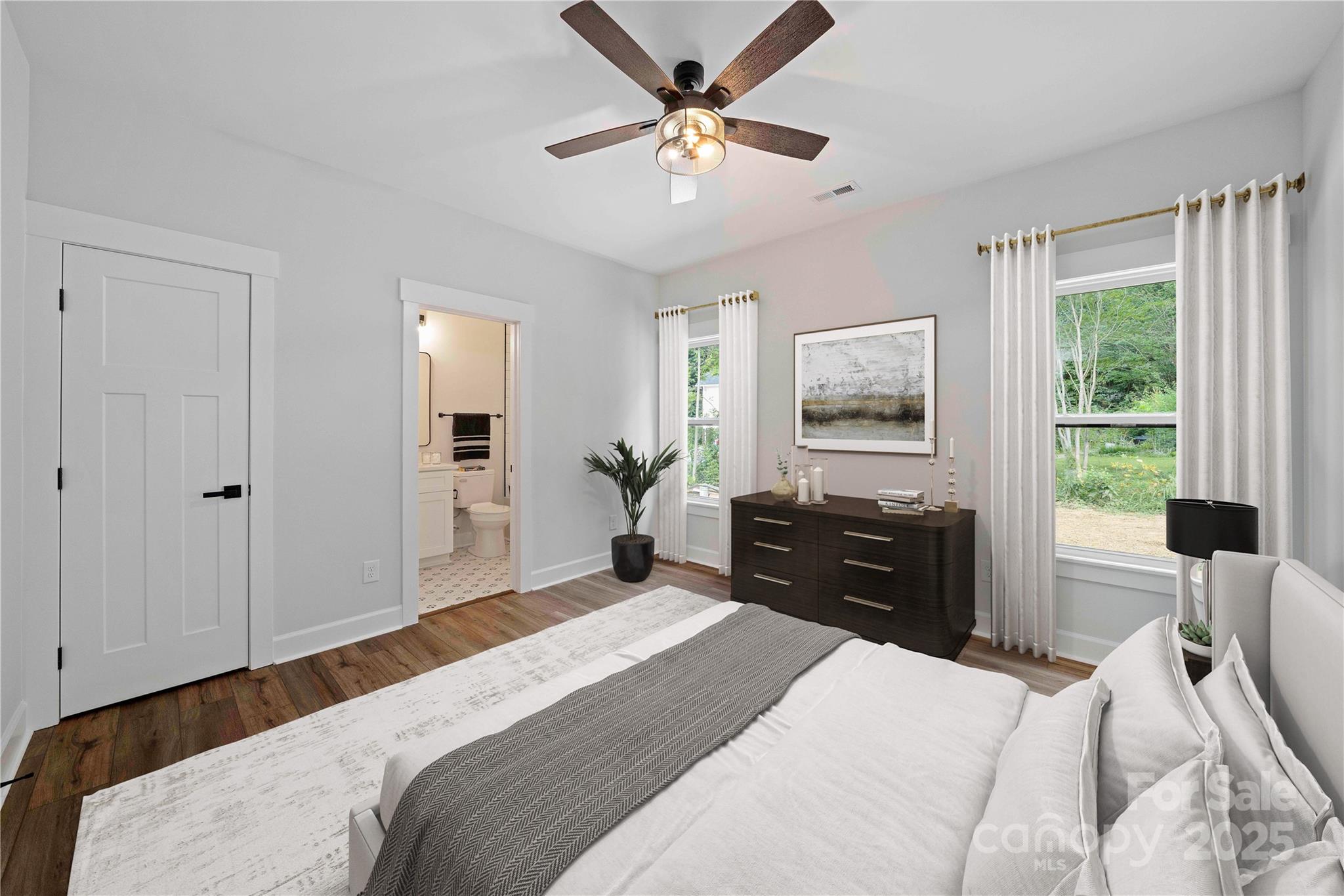 1215 Coppergate Drive Salisbury, NC 28147 - Photo 12 of 41 a bedroom with a bed and a chandelier