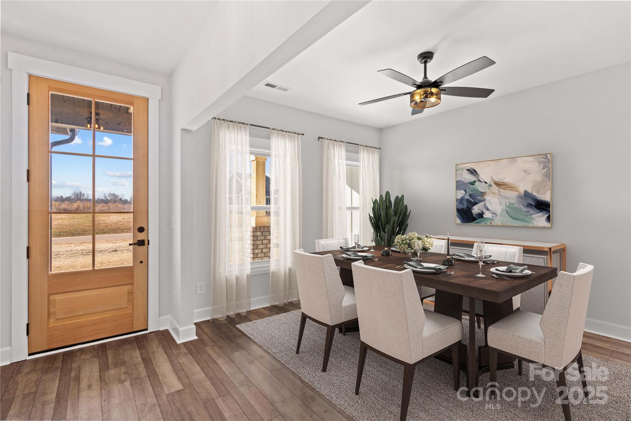 1215 Coppergate Drive Salisbury, NC 28147 - Photo 8 of 41 a view of a dining room with furniture window and wooden floor