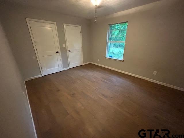 983 Nandena Road Gilmer, TX 75644 - Photo 3 of 9 an empty room with windows