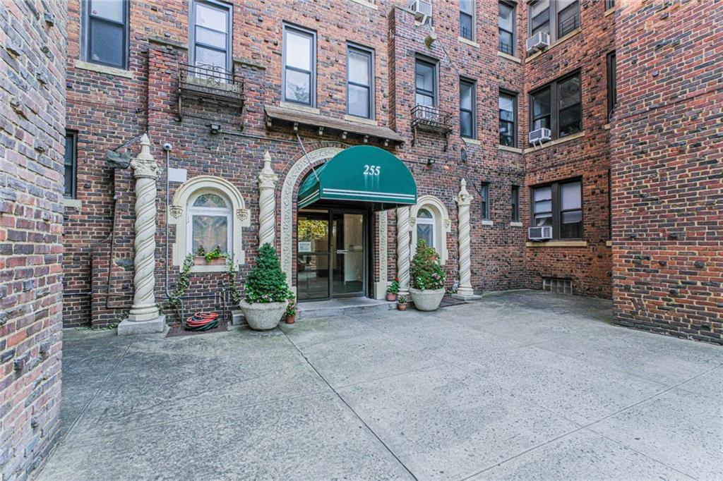 255 79th Street, Unit B2 Brooklyn, NY 11209 - Photo 19 of 22 front view of a brick building with many windows