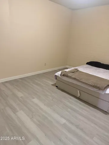 a utility room with a bed