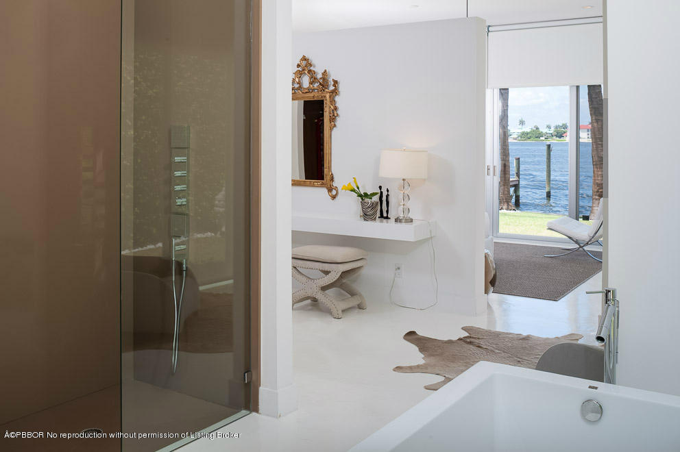 1225 Lands End Road Manalapan, FL 33462 - Photo 12 of 28 a bathroom with a tub and a sink