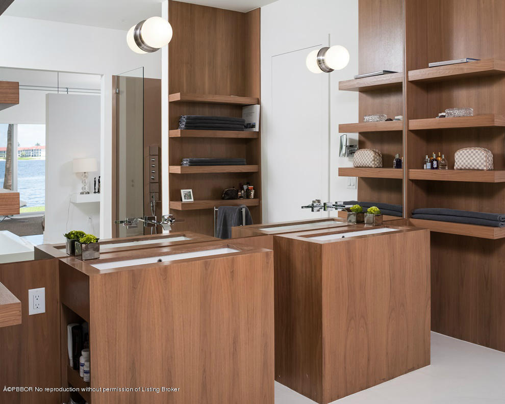 1225 Lands End Road Manalapan, FL 33462 - Photo 13 of 28 a room with stainless steel appliances a refrigerator and cabinets