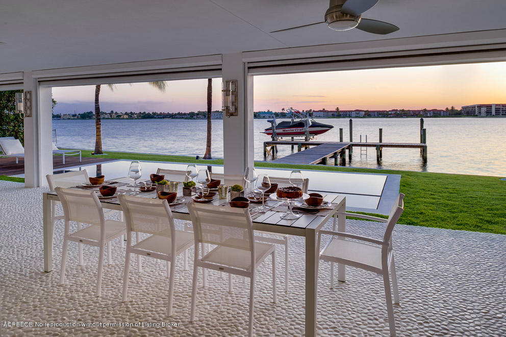 1225 Lands End Road Manalapan, FL 33462 - Photo 26 of 28 a view of a dining room with furniture and window