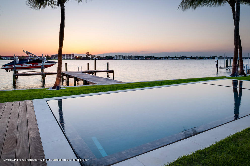 1225 Lands End Road Manalapan, FL 33462 - Photo 27 of 28 a view of swimming pool with furniture