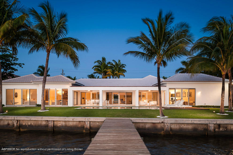 1225 Lands End Road Manalapan, FL 33462 - Photo 28 of 28 a front view of a house with a garden