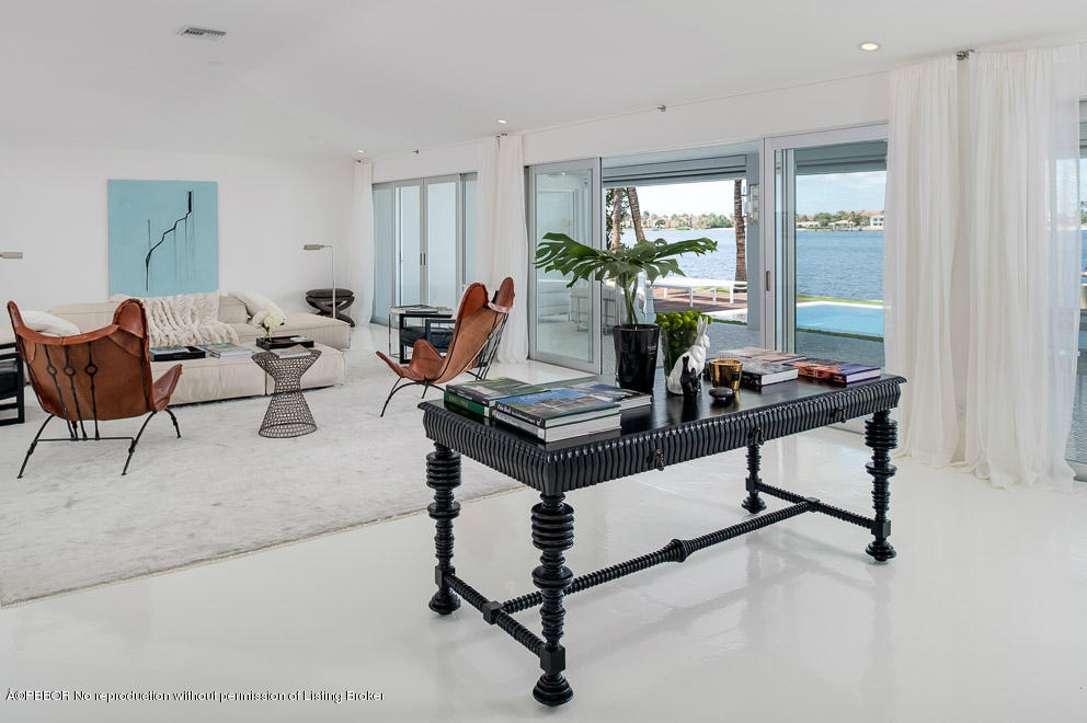 1225 Lands End Road Manalapan, FL 33462 - Photo 6 of 28 a living room with furniture a window and a potted plant