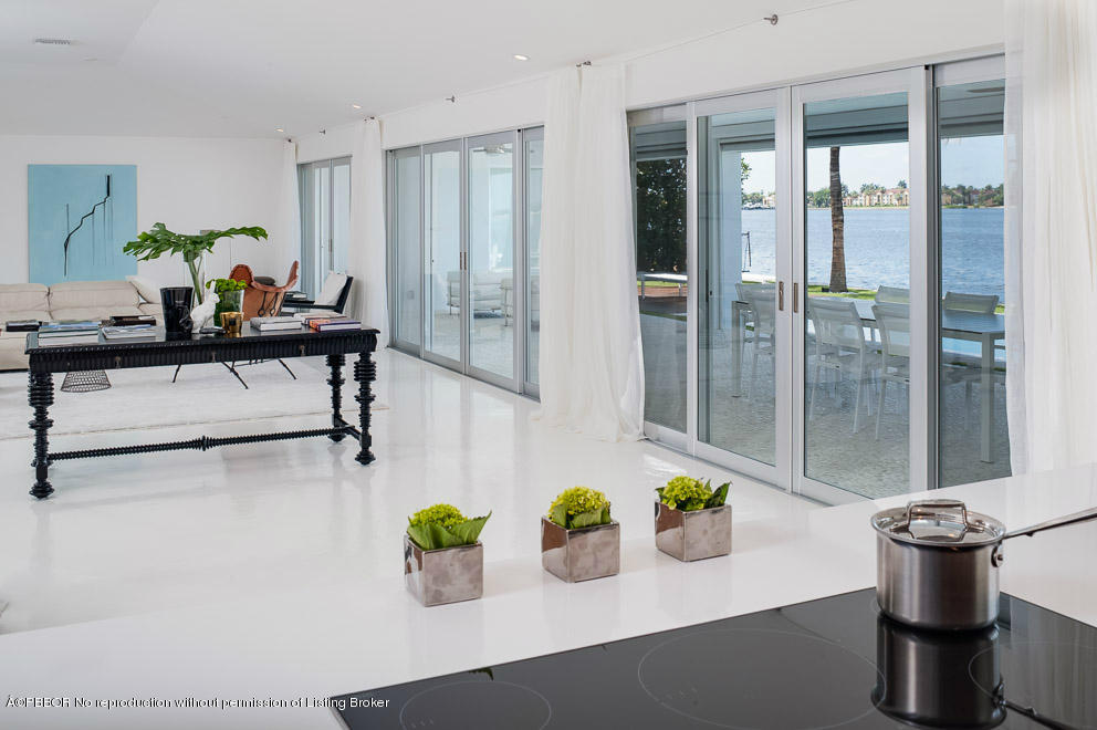 1225 Lands End Road Manalapan, FL 33462 - Photo 8 of 28 a kitchen with a sink and breakfast area