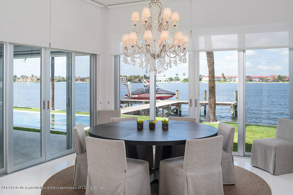 1225 Lands End Road Manalapan, FL 33462 - Photo 10 of 28 a view of a dining room with furniture window and outside view