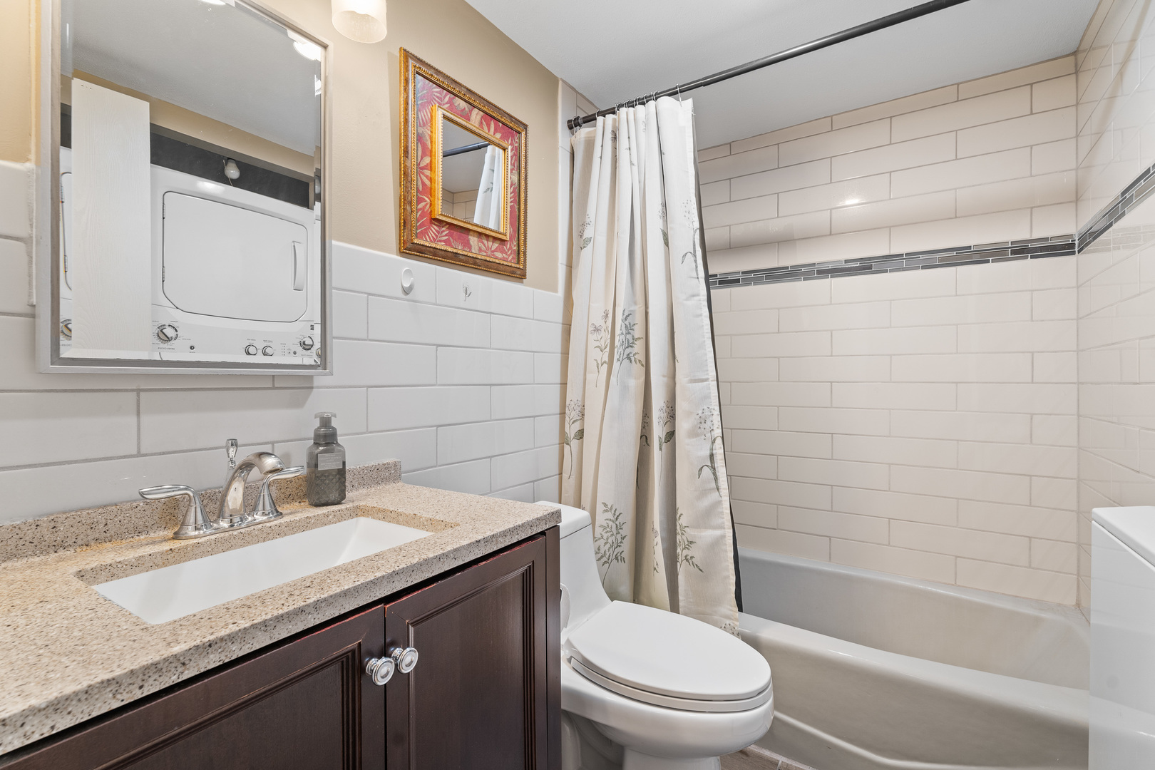 730 Briar Hill Lane, Unit 1 Addison, IL 60101 - Photo 12 of 16 a bathroom with a granite countertop sink toilet and shower