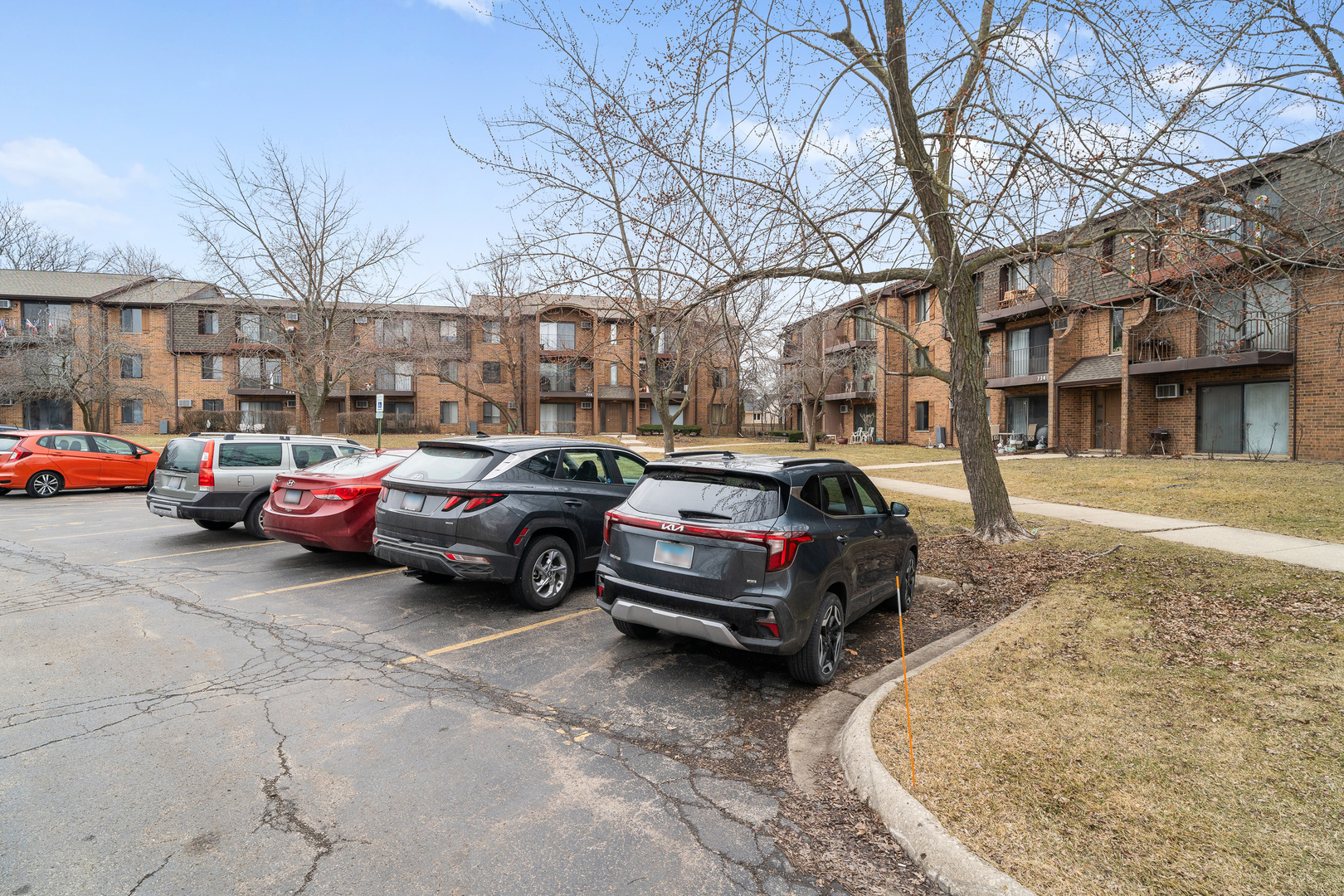 730 Briar Hill Lane, Unit 1 Addison, IL 60101 - Photo 16 of 16 a car parked in front of a building