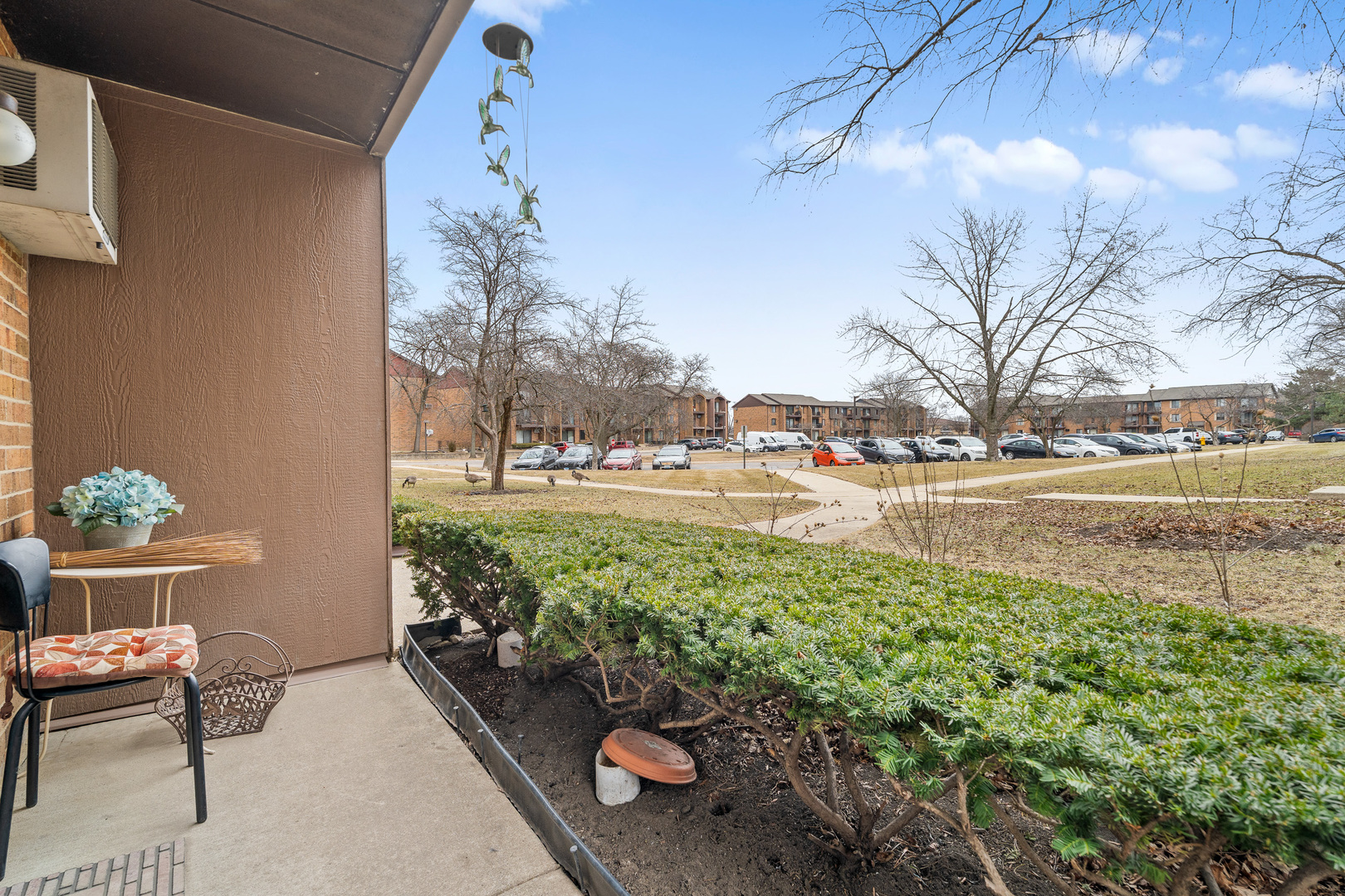 730 Briar Hill Lane, Unit 1 Addison, IL 60101 - Photo 4 of 16 a view of a garden with water fountain
