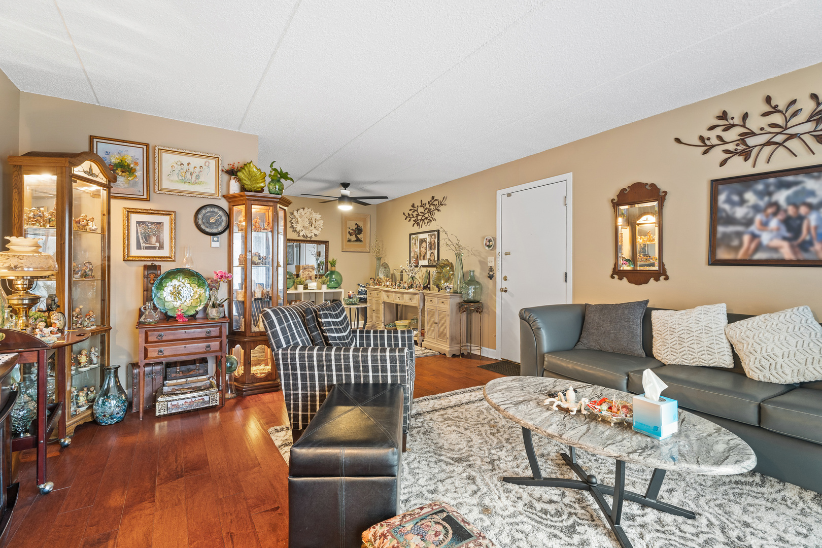 730 Briar Hill Lane, Unit 1 Addison, IL 60101 - Photo 5 of 16 a living room with furniture and wooden floor